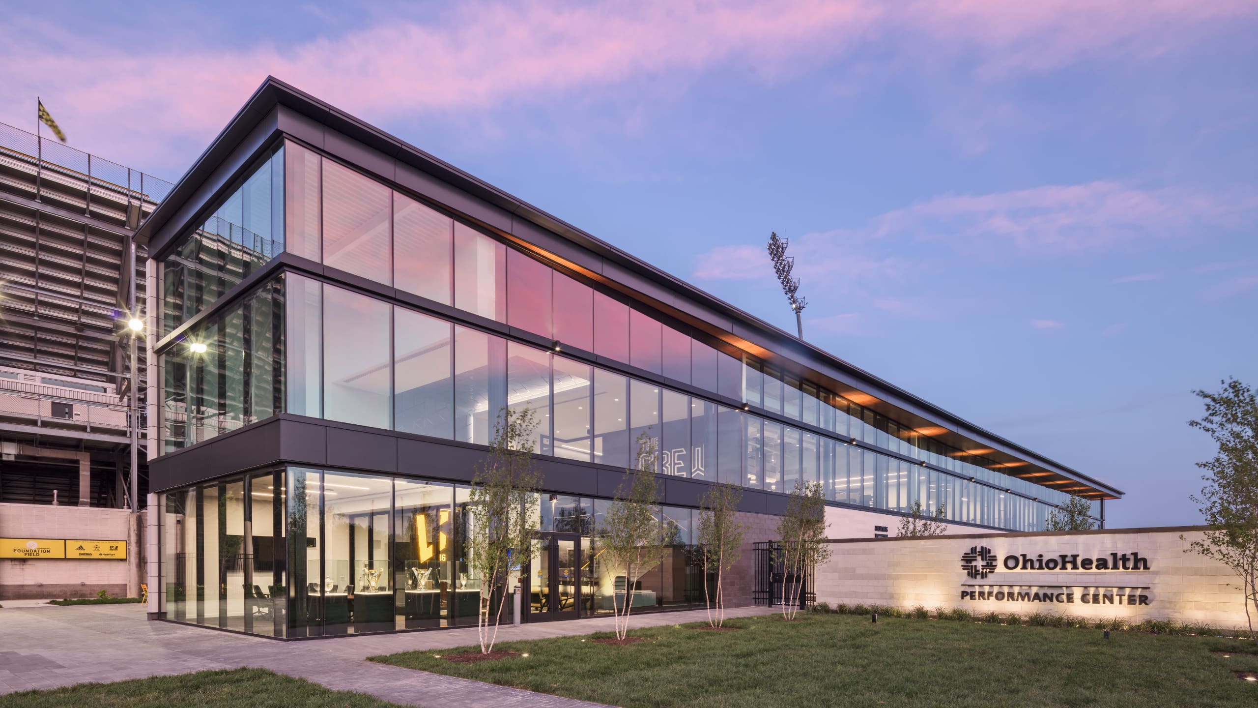 Tucked away in the middle of an urban neighborhood, the sleek and slim OHPC feels like an oasis with rows of trees, plush landscape lining walkways and parking.